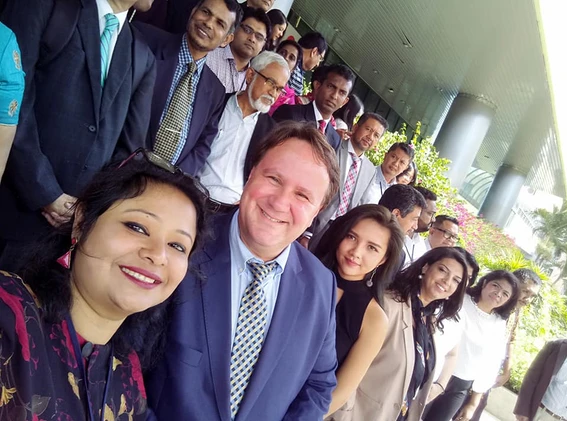 Dr. Cobanoglu with students and colleagues