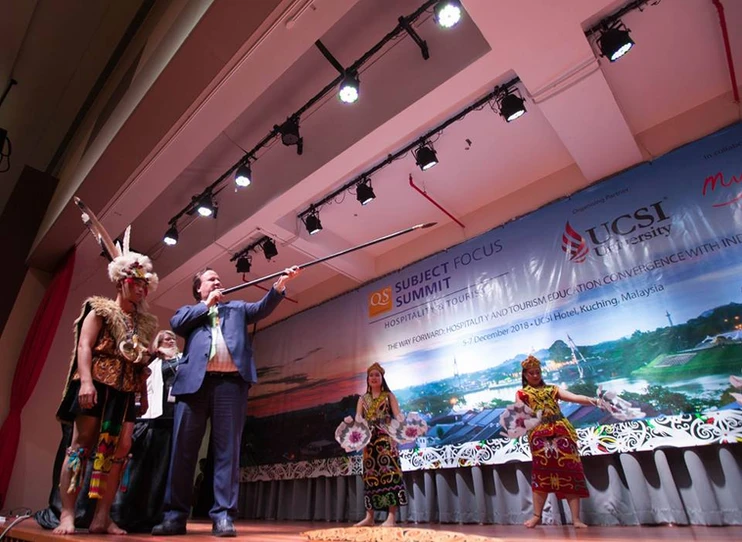 Dr. Cobanoglu speaking at an international conference